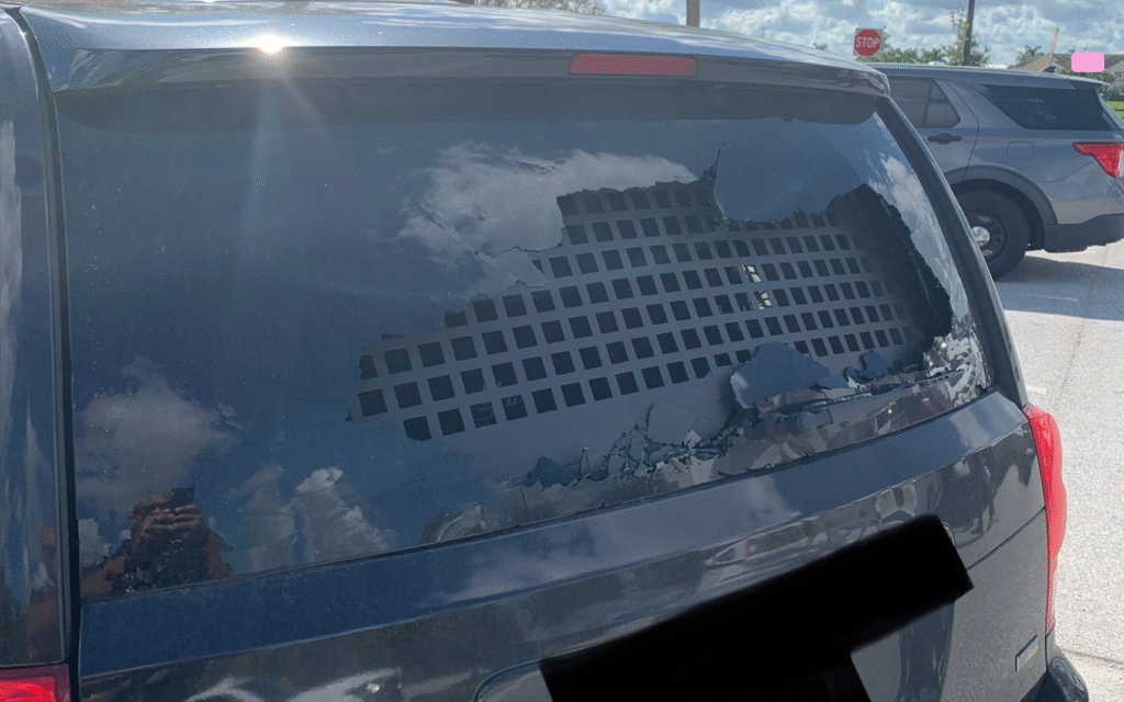 ICE Vehicle Damaged by Rock Attack in Port St. Lucie - Port St Lucie Talks Shattered rear window of ICE vehicle at Wawa in Port St. Lucie from rock attack during police operation.