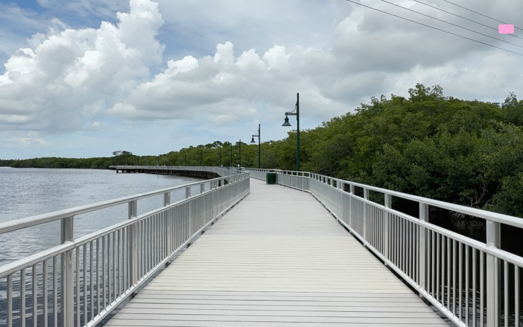 Port St Lucie Police at St Lucie River boardwalk during death investigation near Twin Bridges