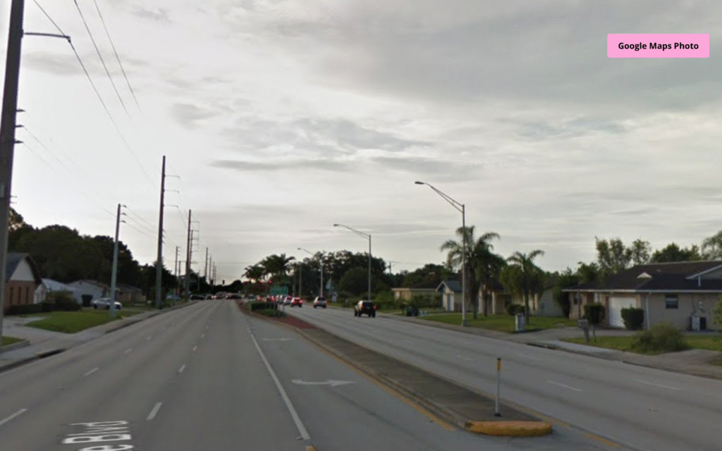 Police and vehicles at SE Port St Lucie Blvd crash site where pedestrian was fatally struck