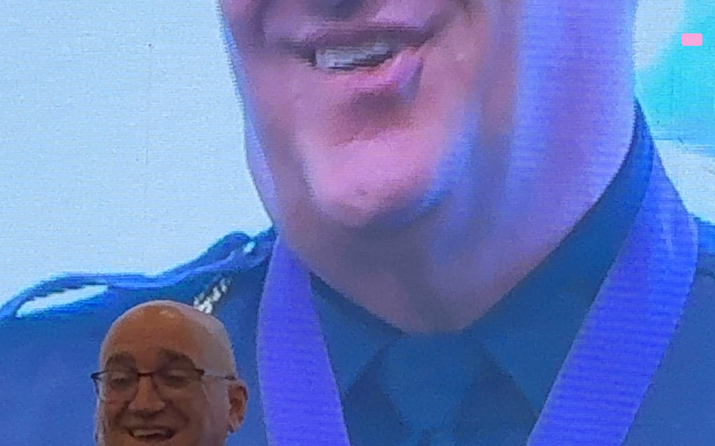 Sgt Erik Levasseur receiving Purple Heart award at Port St Lucie Police ceremony